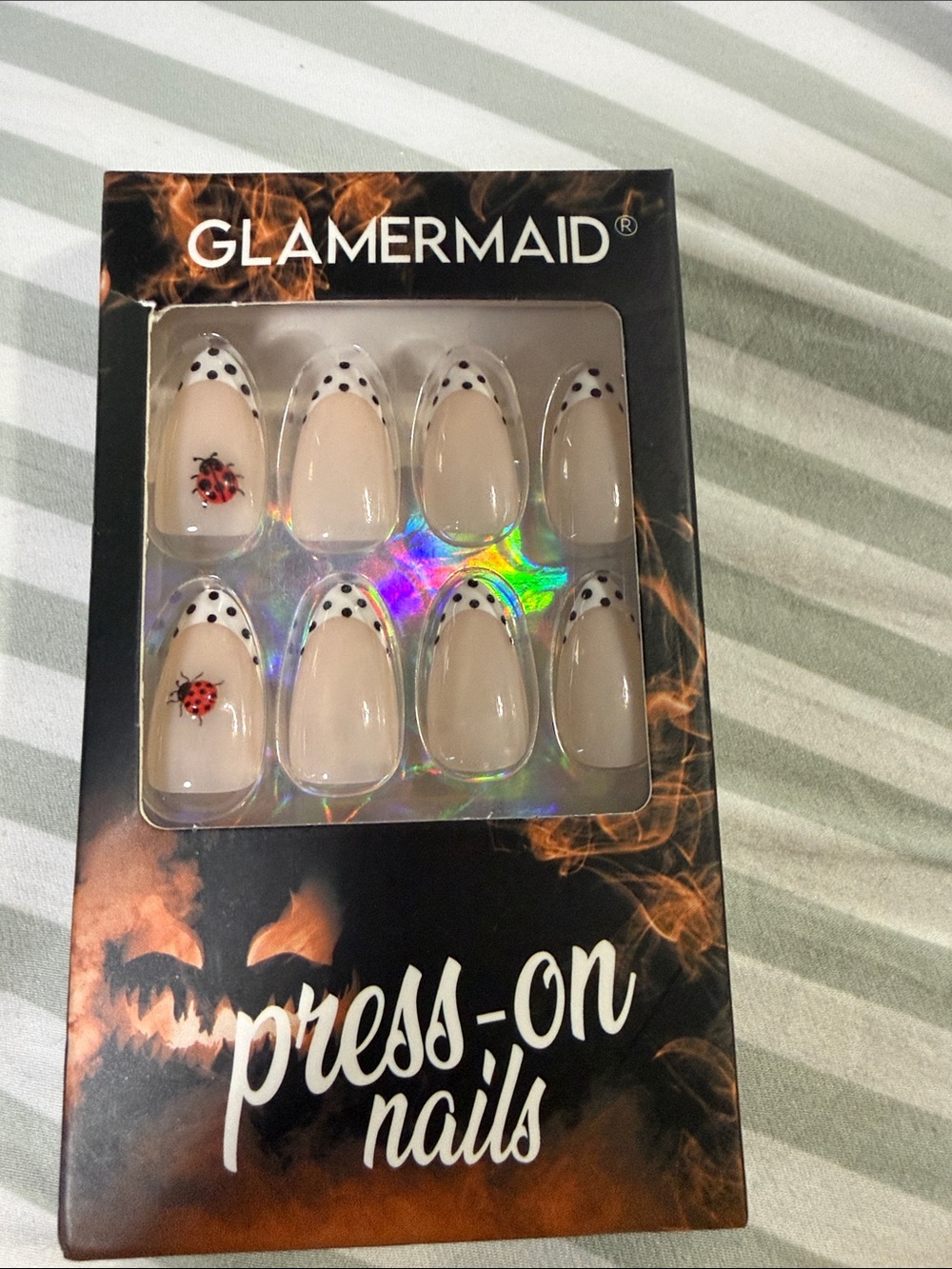 Nude Press-On Nails with Black Polka Tips and Red Ladybug Accent